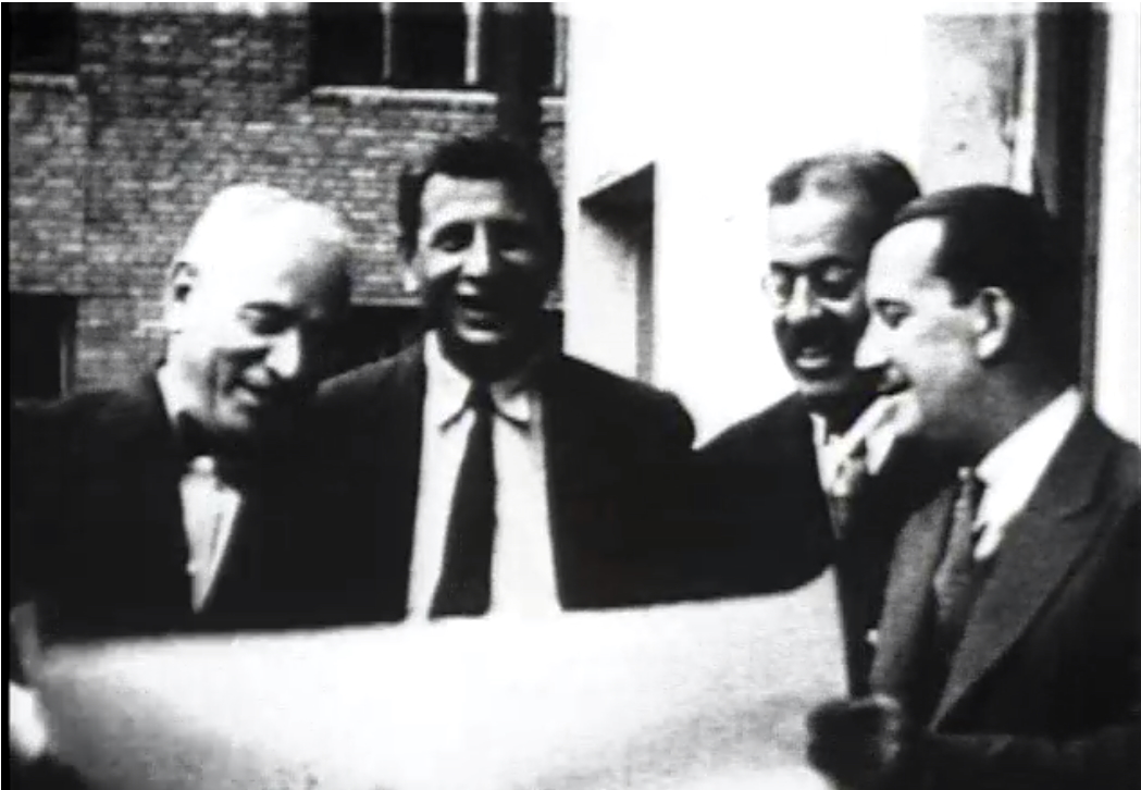 Слева направо: Иосиф Розен, Иезекииль Гроер, Самуил Любарский (заместители Розена), Моррис Тропер (директор Европейского отделения «Джойнта»). Кадр из кинохроники 1936 г. Источник: US Holocaust Memorial Museum